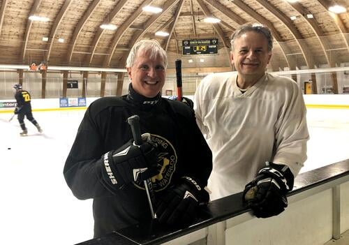 Engineering professors Dr. David Clausi (left) and Dr. John Zelek play pickup hockey together and lead research at the Universit