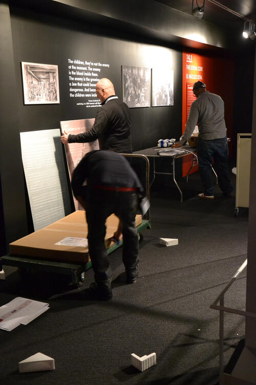 Robert Jan (middle) installing New York exhibit