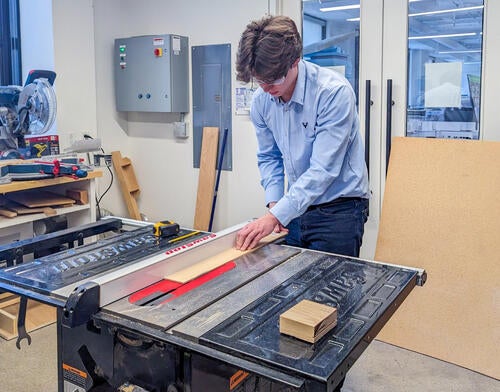 Thomas Coleman works in the ZGF fabrication lab