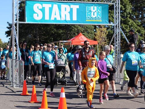 Participants take off from the Fun Run starting line