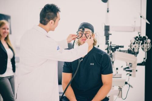 A patient is examined in the Sport Vision Clinic