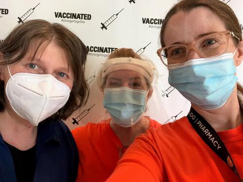 Professor marianna foldvari, administrative officer Trenny McGinnis and Professor cynthia richard take a selfie with PPE.