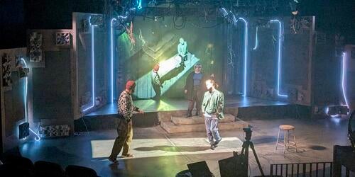 Zach McKendrick on stage with actor directing rehearsal of The Nether