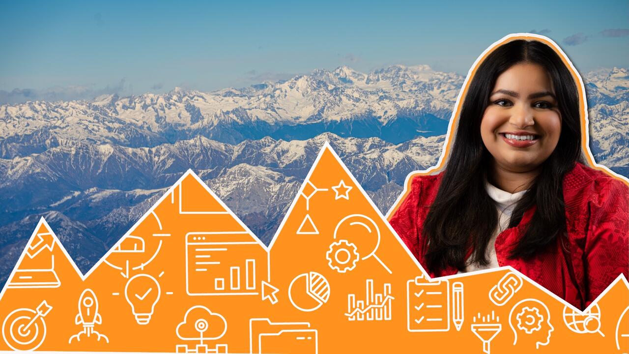 woman's smiling face with snowy mountains in background and graphic designs in foreground