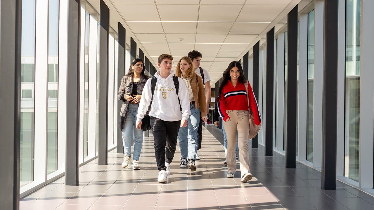 Students walking down a hallway