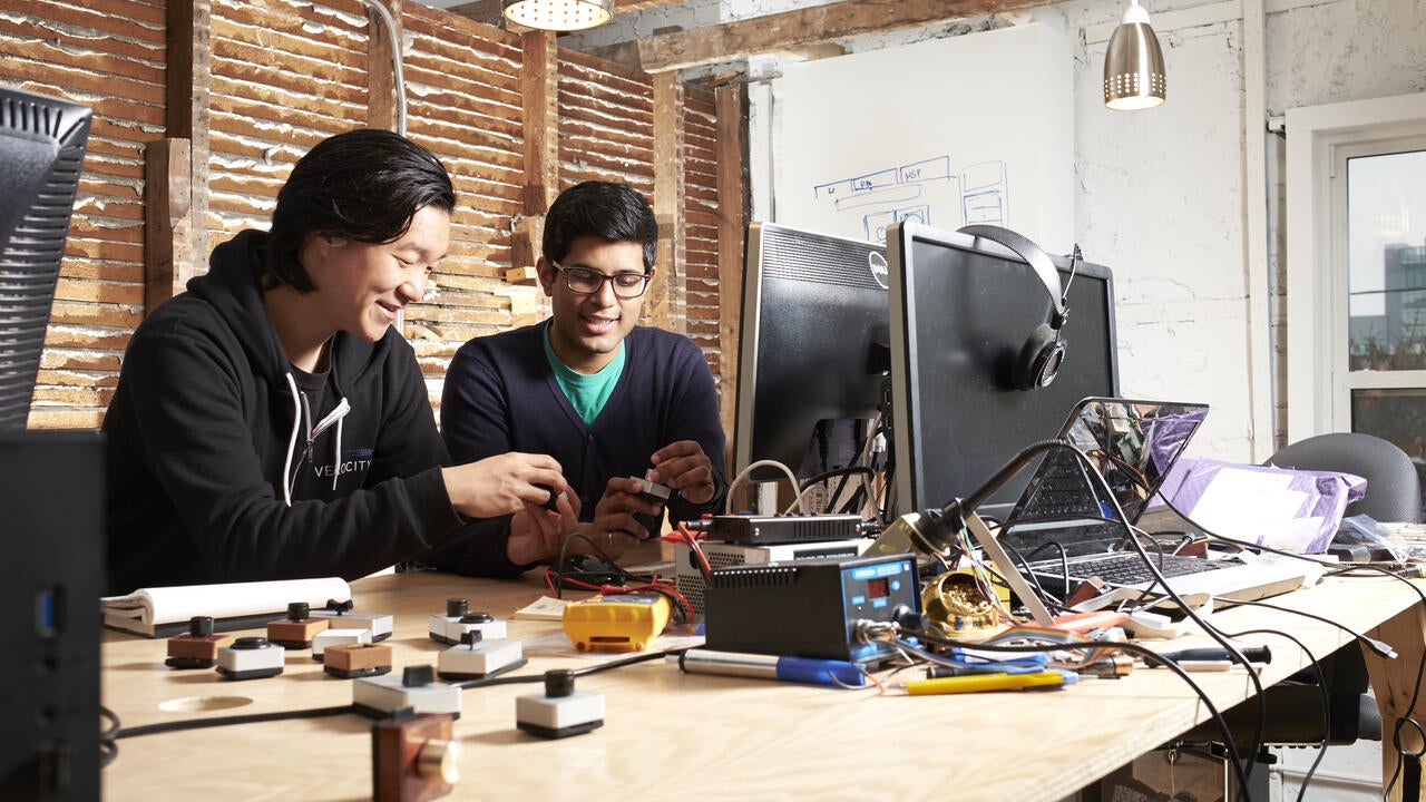 Co-founders work together in the Velocity Garage