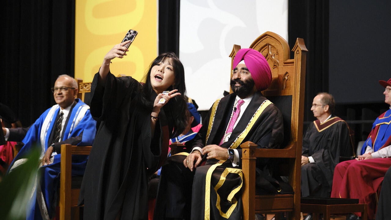 Waterloo chancellor on convocation stage