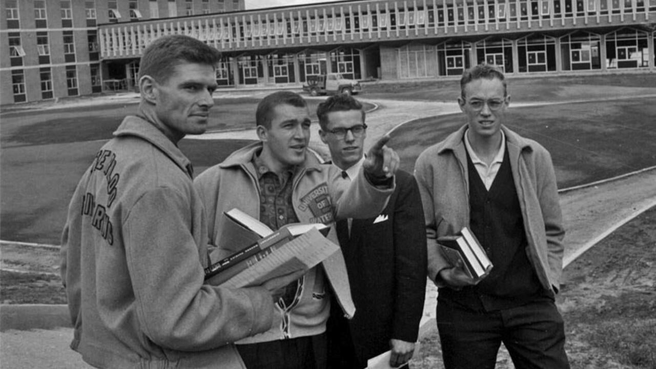 engineering students stand in the Carl Pollock Hall courtyard in 1960's