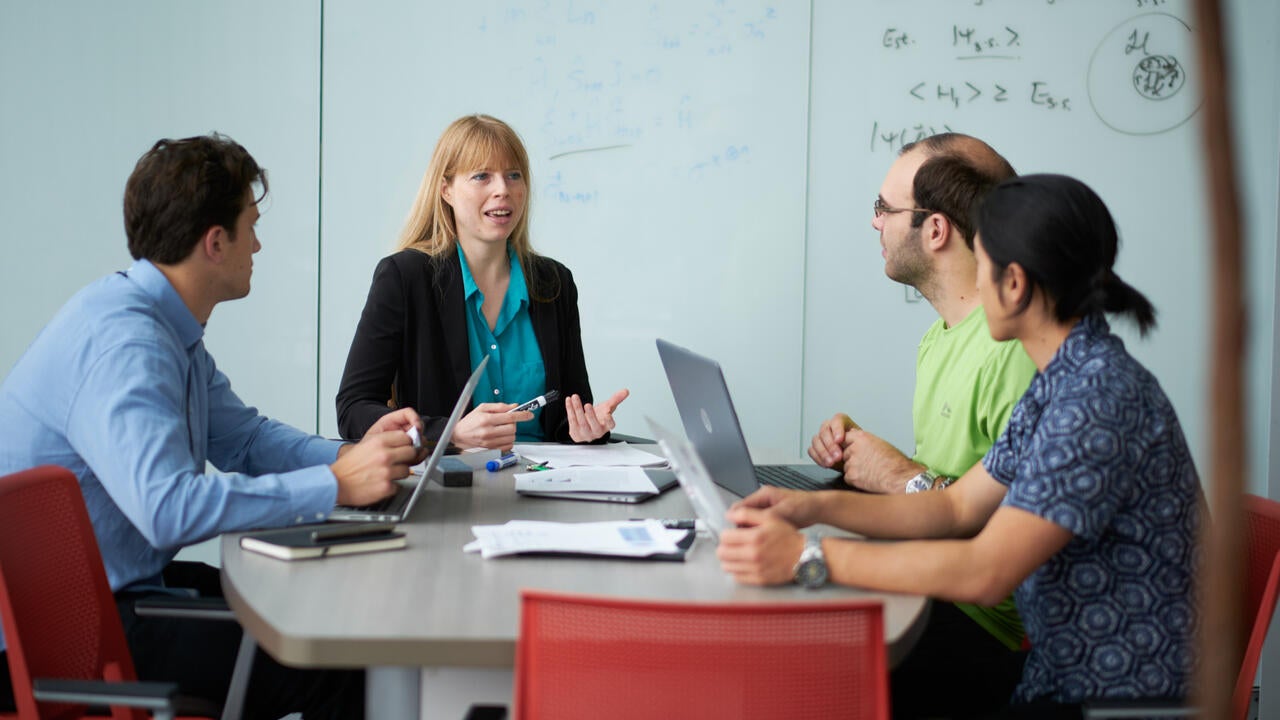 Dr. Christine Muschik with postdoctoral fellows