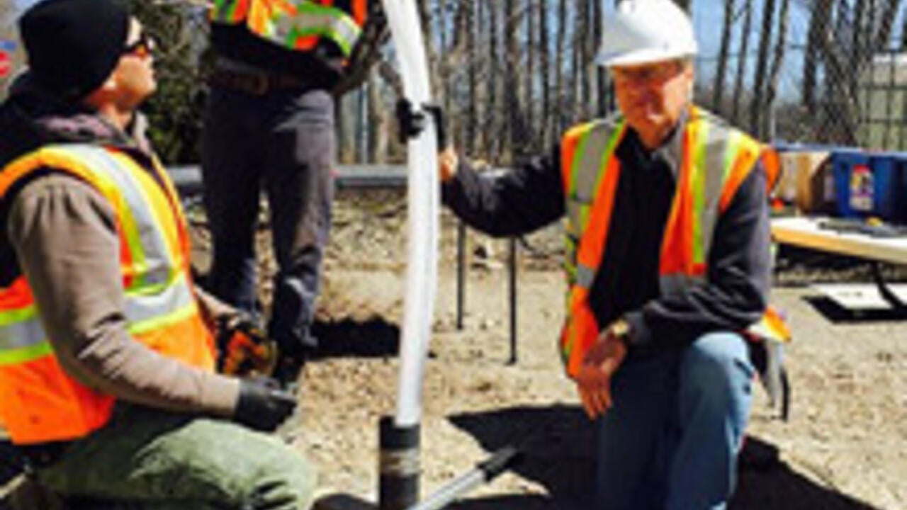 Professor John Cherry working in the field