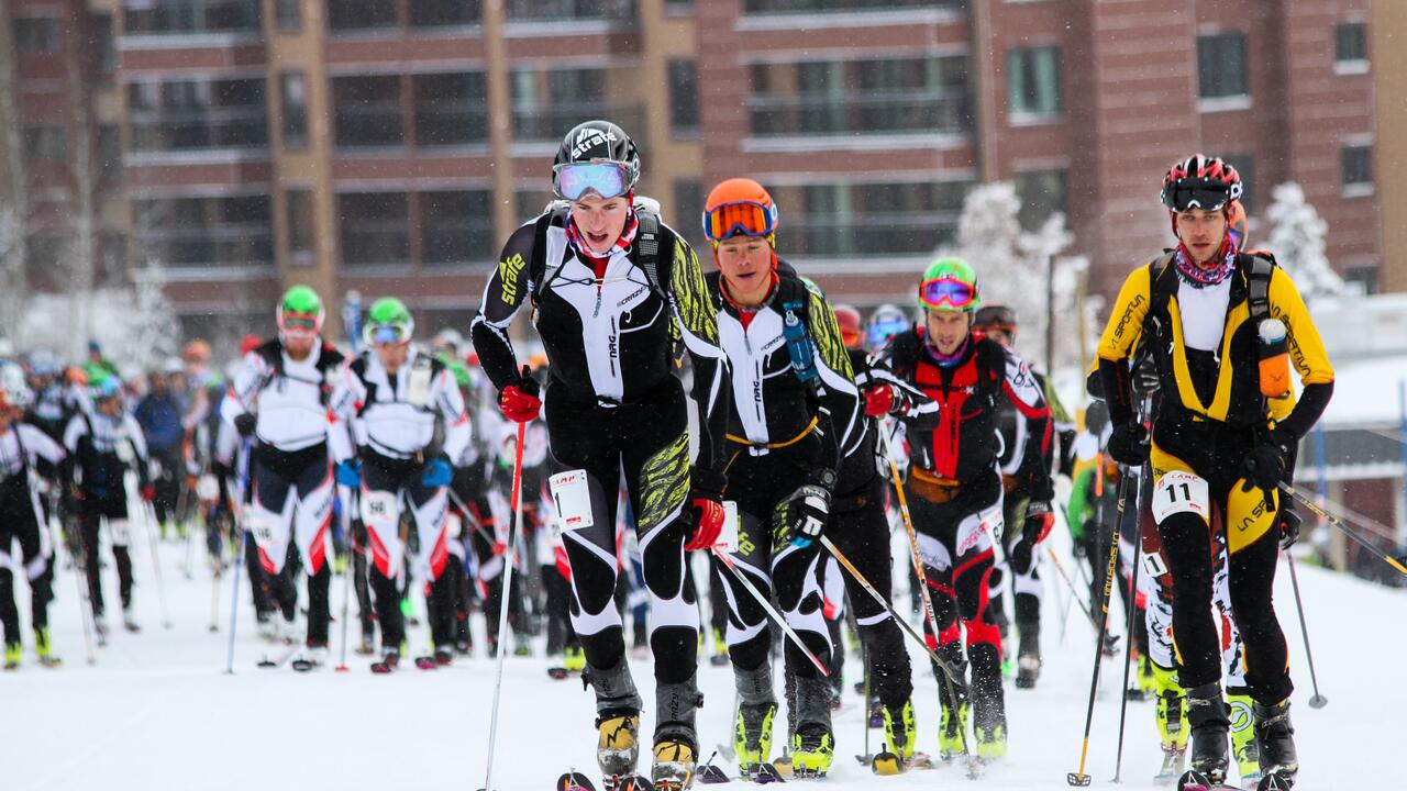 group of skiers racing