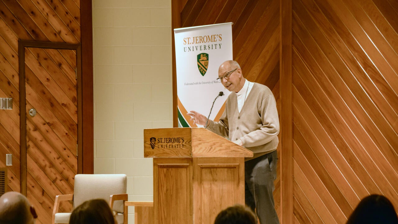 Archbishop Bolen speaking at St Jerome's University