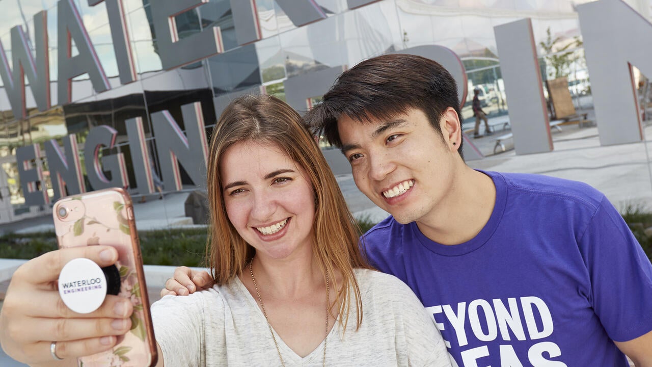 Two student taking selfie outside engineering 7