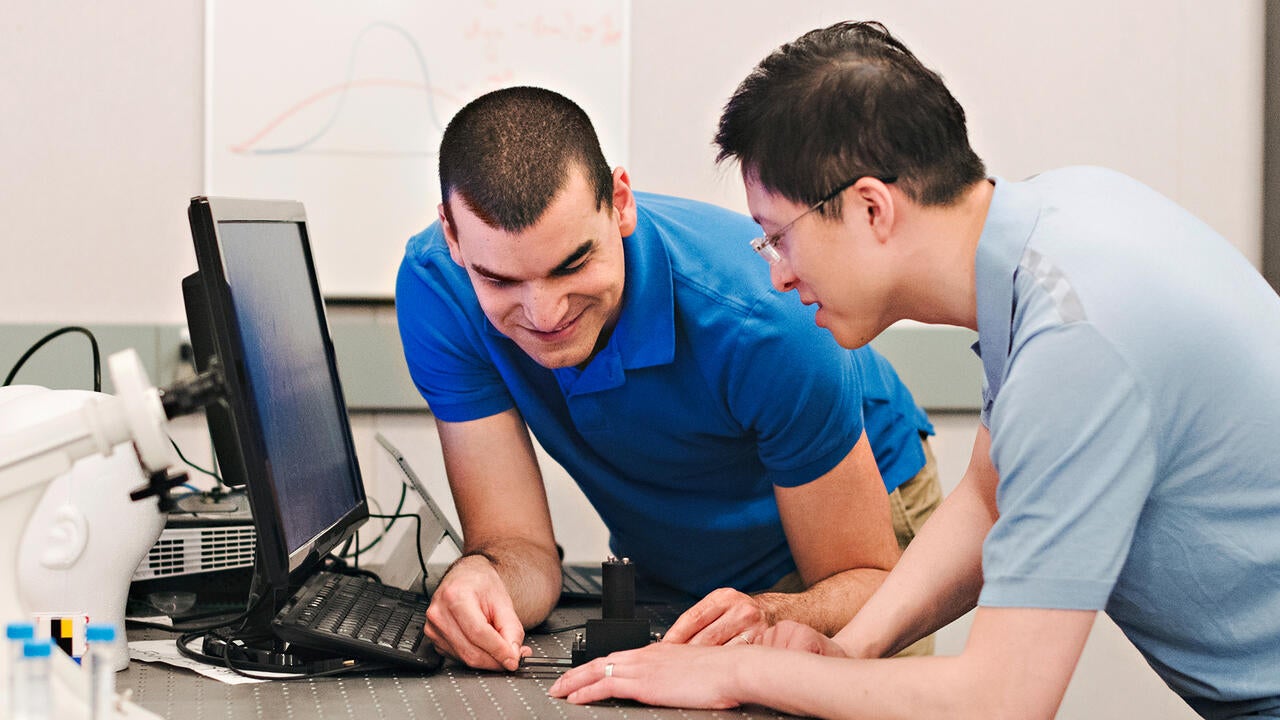 Cofounders of Elucid Labs, Farnoud Kazemzadeh and Alexander Wong, tinkering with technology 