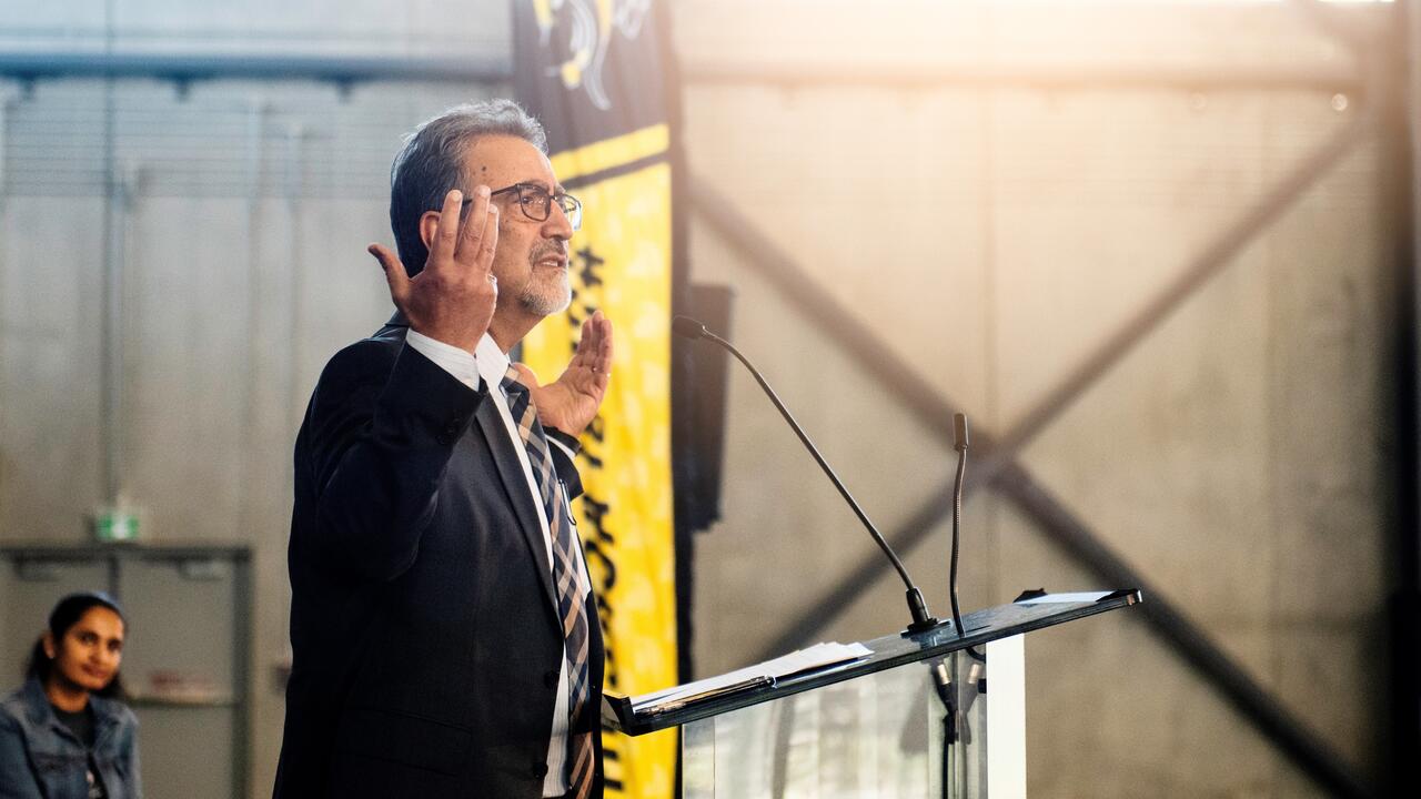 Feridun Hamdullahpur speaks at the grand opening of the Field House in 2019