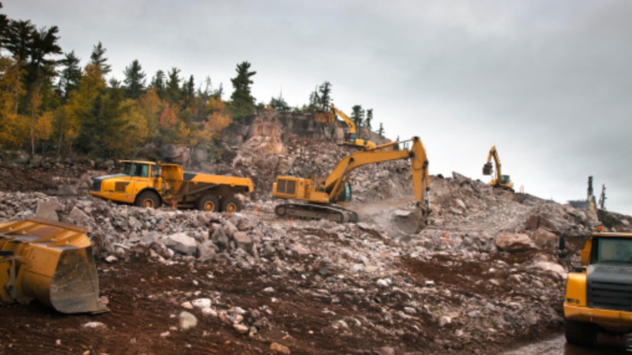 Machines used for widening road in Northern Ontario