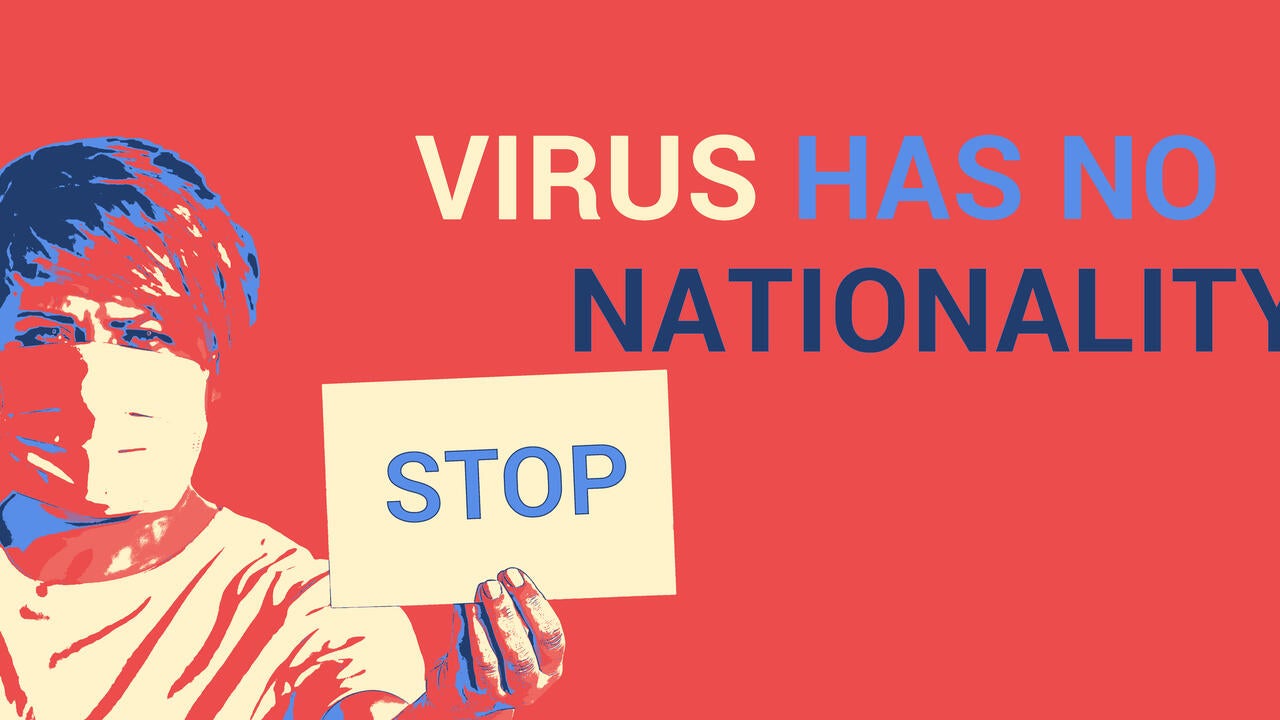 Graphic with the words: Virus has no nationality and a the image of someone holding a sign reading 'stop'