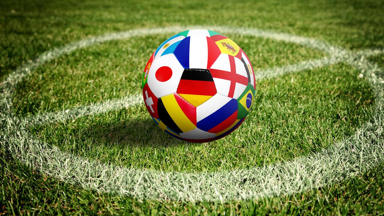 Soccer ball on green playground