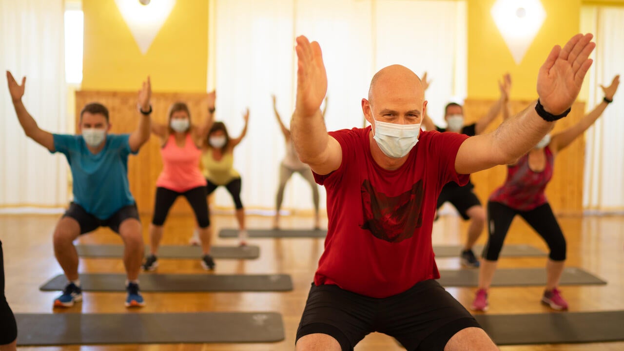 People exercising in face mask