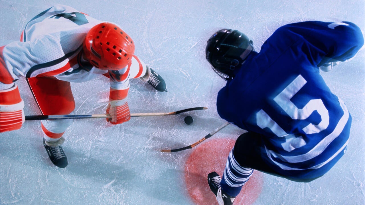 Ice hockey players in face-off