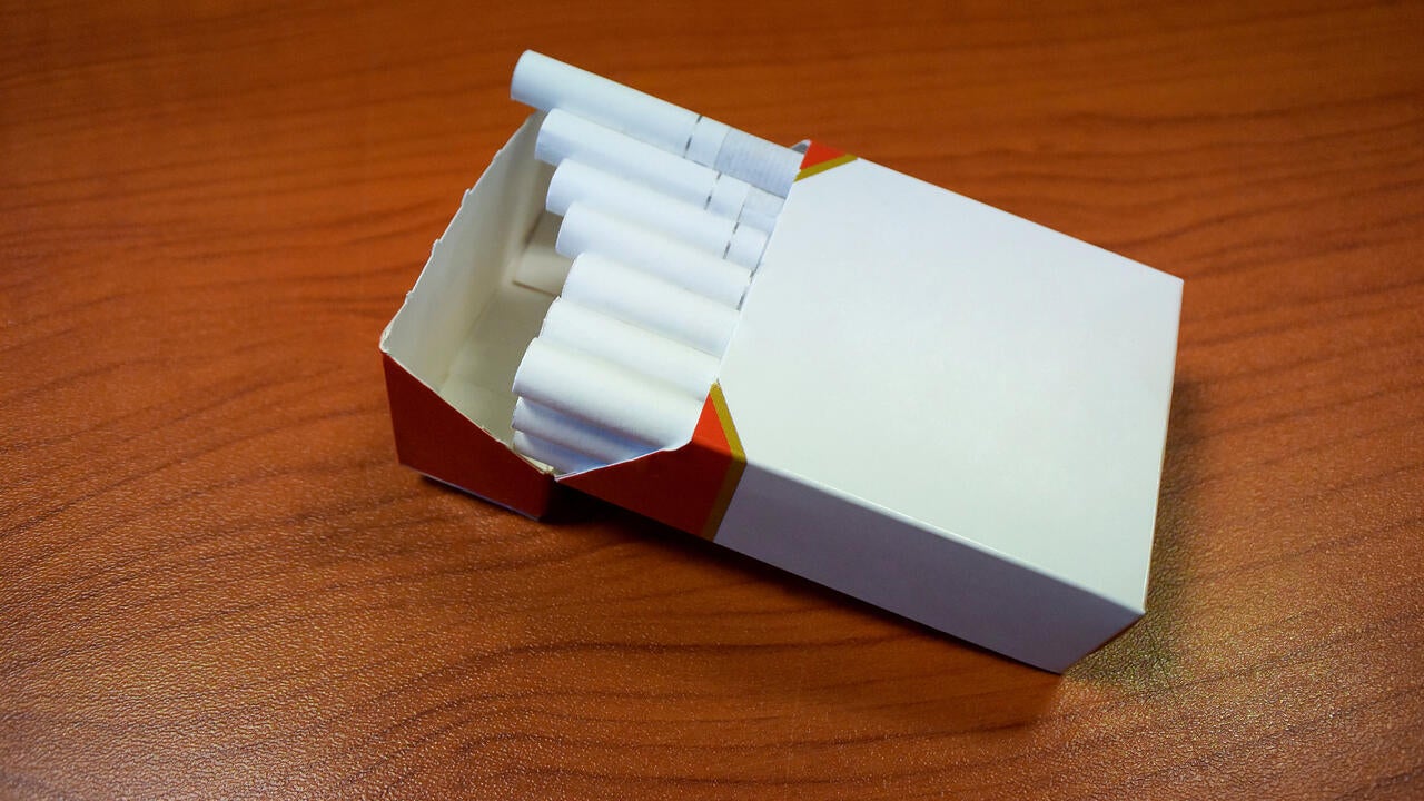 Unbranded cigarette pack on a table