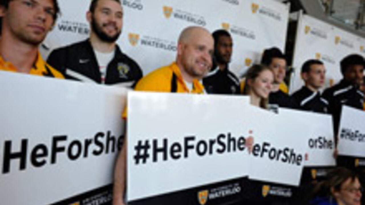 University of Waterloo students holding HeForShe signs