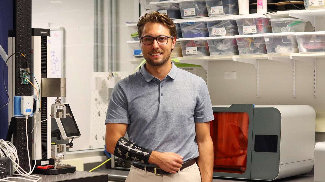 Nicholas Levinski wearing a prototype of the lymphedema sleeve