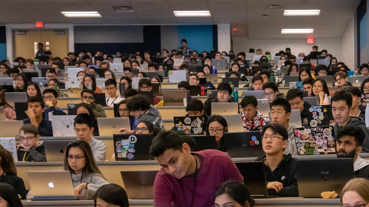 StarterHacks students in lecture hall with laptops