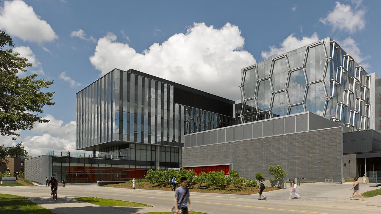 Exterior of the Mike and Ophelia Lazaridis Quantum-Nano Centre in the spring