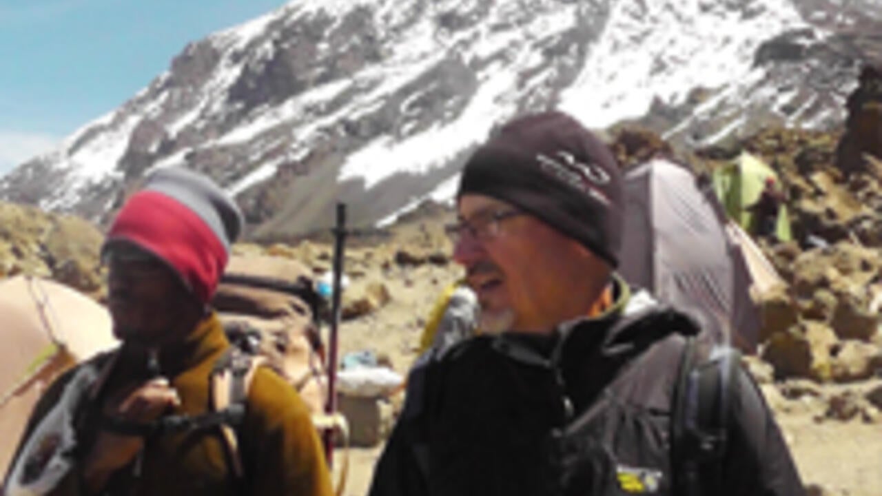 Larry Swatuk at the base of Kilimanjaro