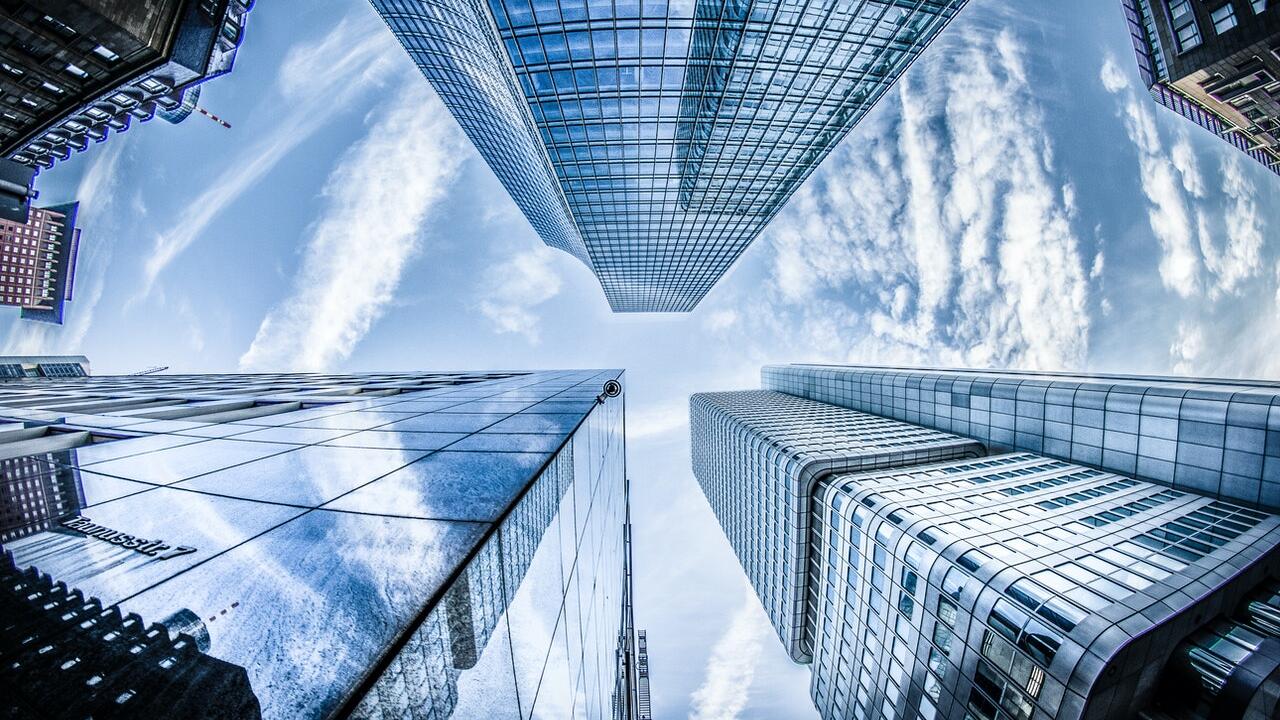 view looking up at high rise buildings