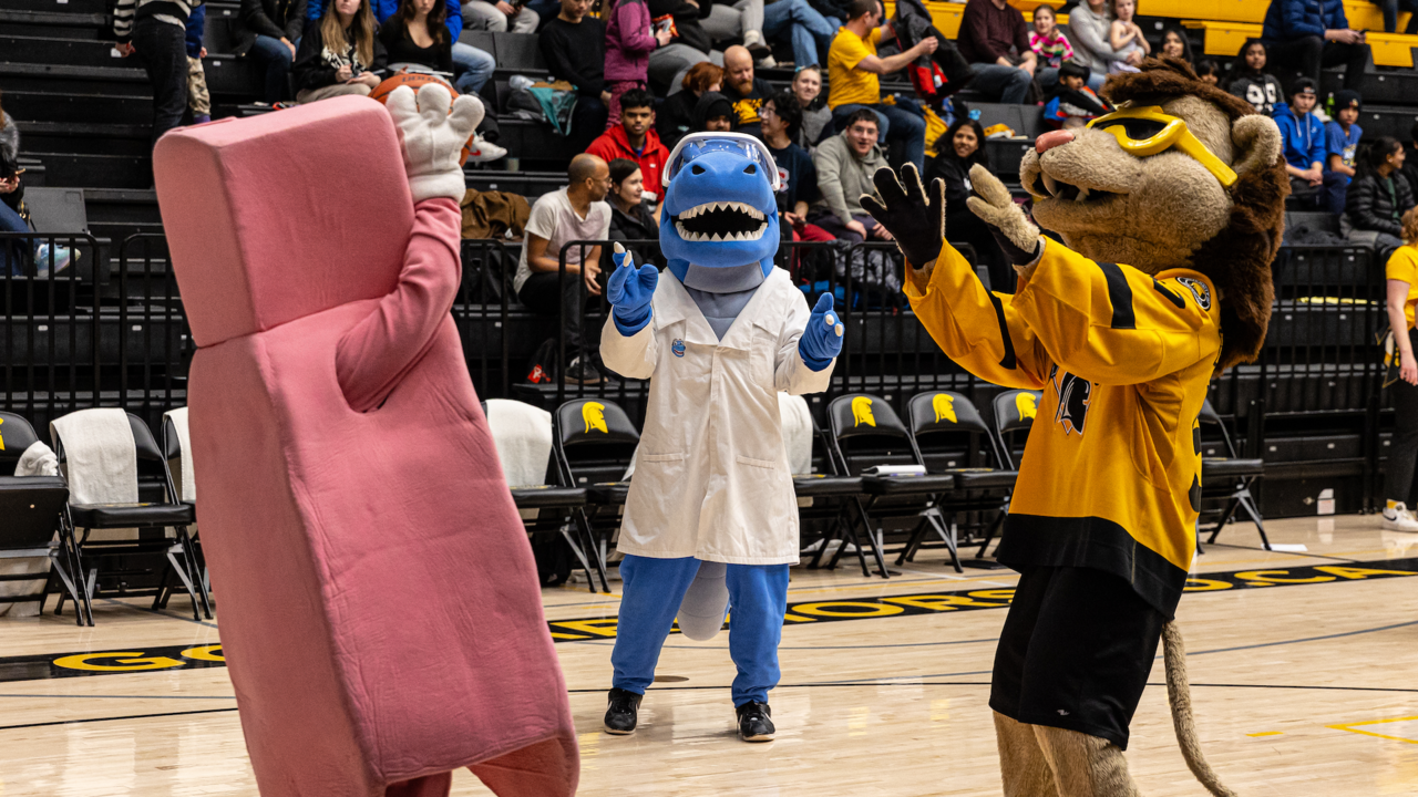 UWaterloo mascots play basketball on the PAC court