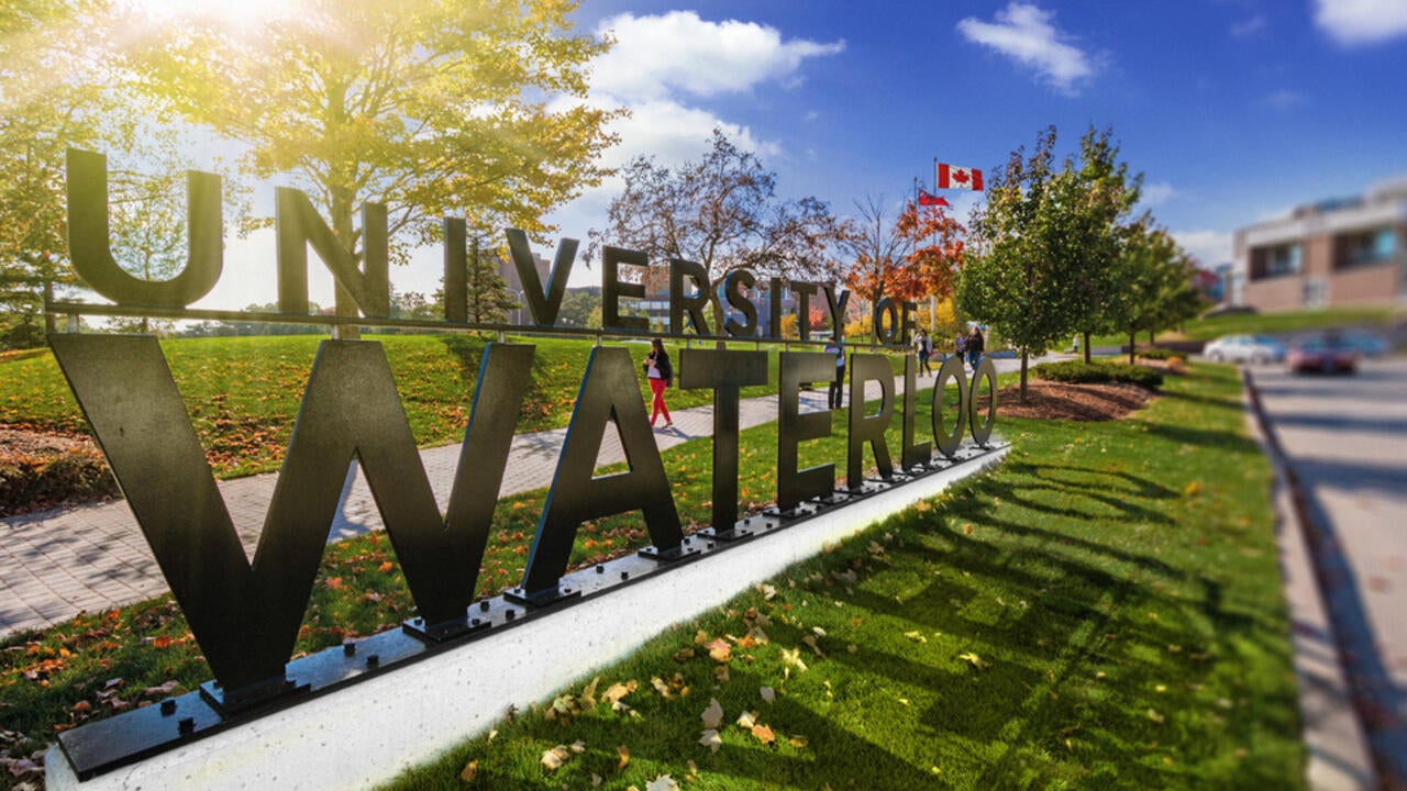 University of Waterloo sign on a sunny fall day