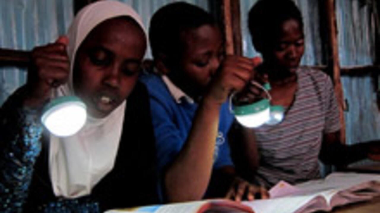 Students using Nokero solar lights