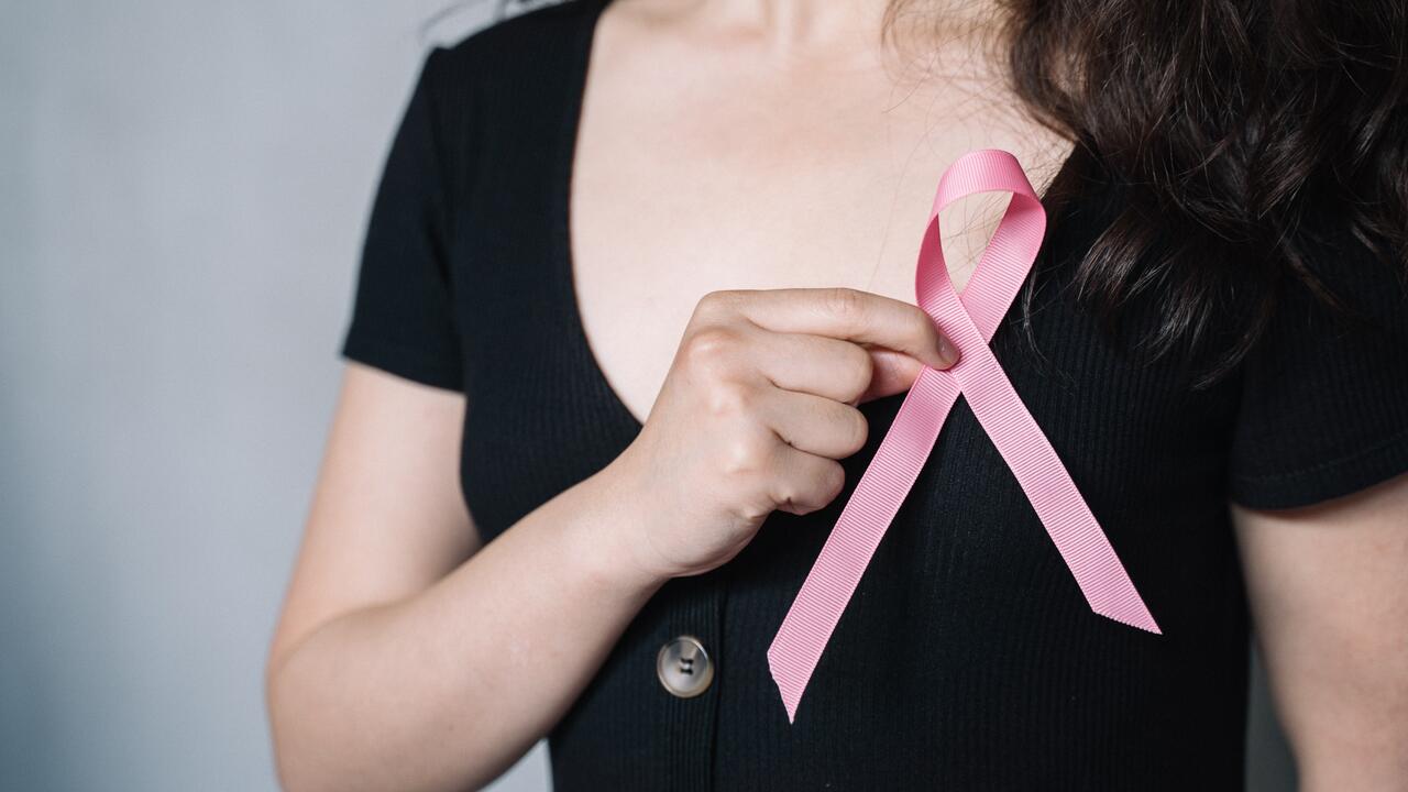 Woman with breast cancer ribbon 