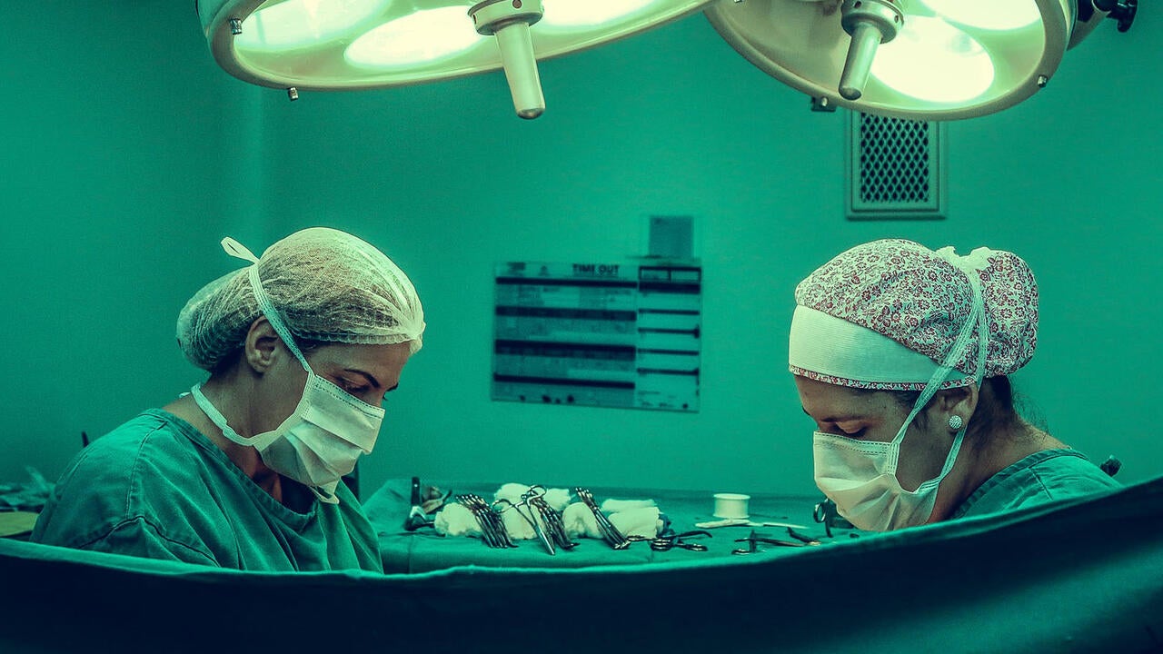 Doctors in surgery room