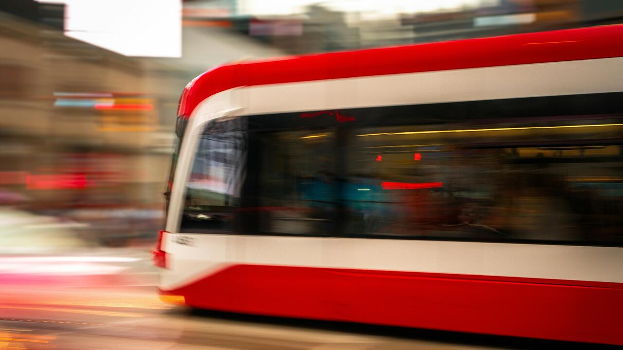 Public transit vehicle moves quickly 