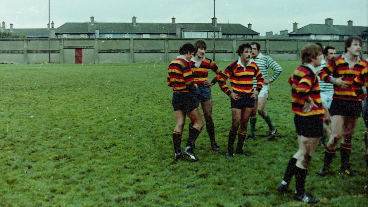 Stephen Webb on a rugby field with teammates