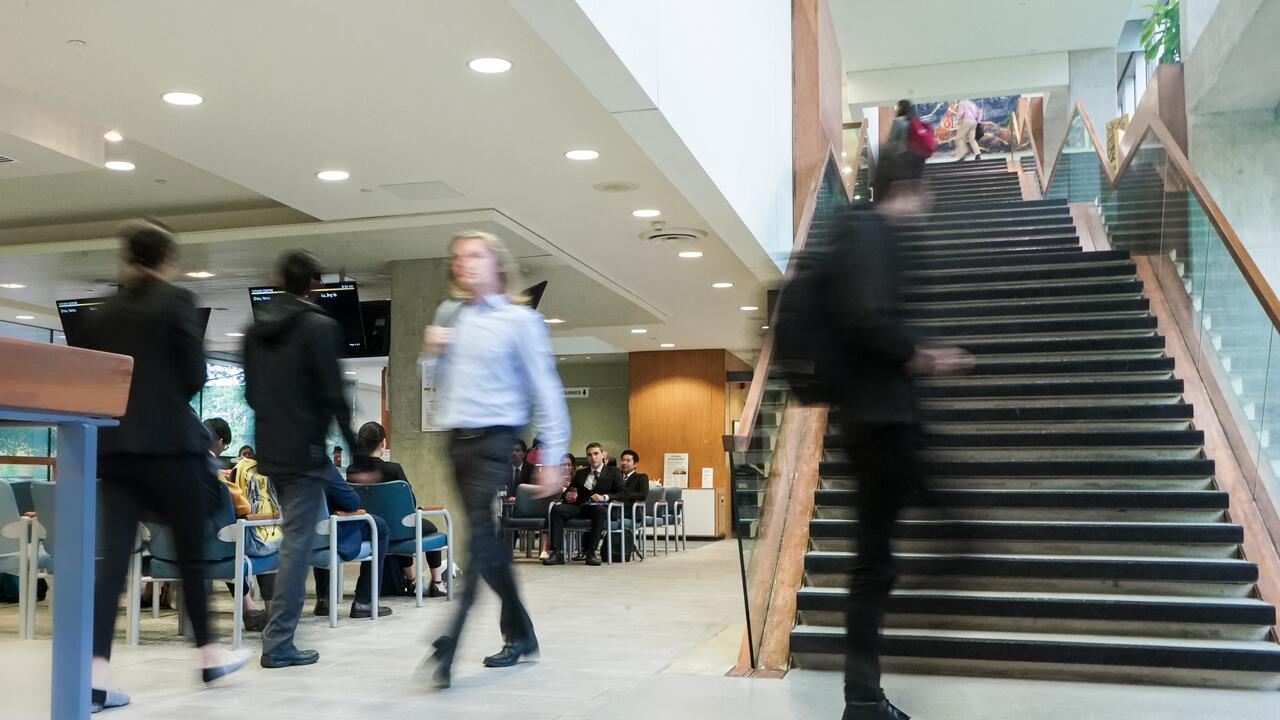 University students walking through a building For many students, university is an exciting way to propel their career whether i