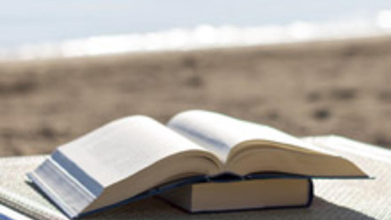 Open book on a beach