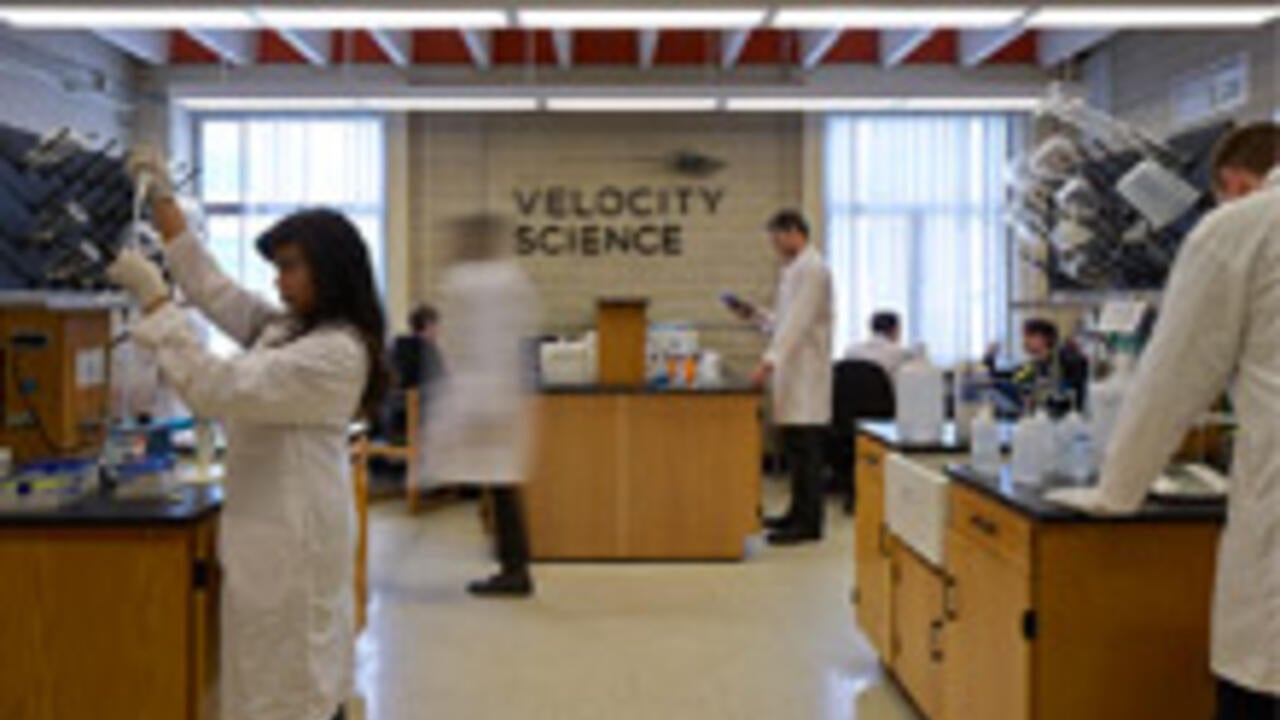Students conducting experiments in the Velocity Science lab