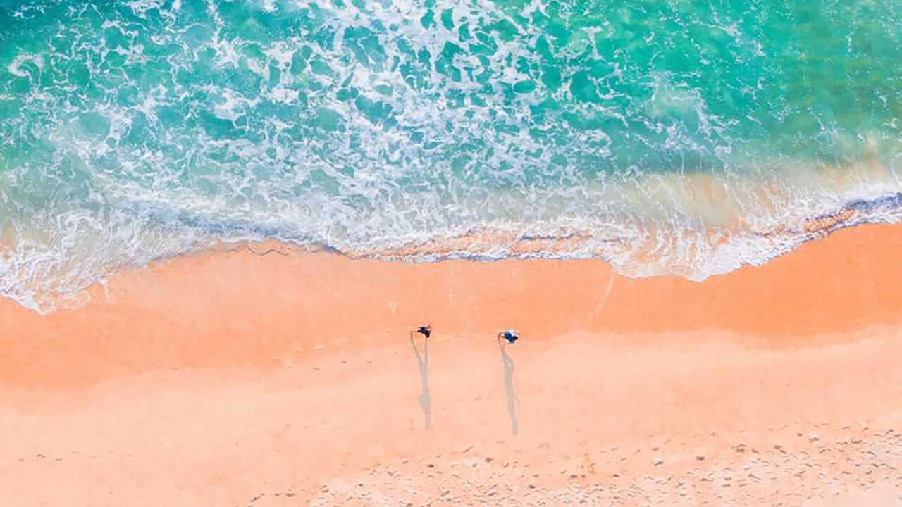 Aerial view of sand and water