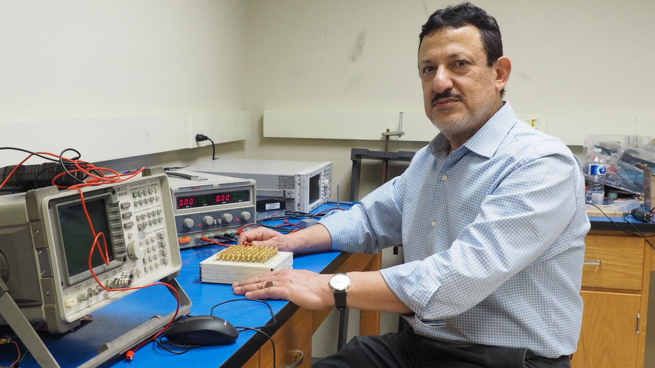 Professor Omar Ramahi sitting in his lab at the University of Waterloo. 