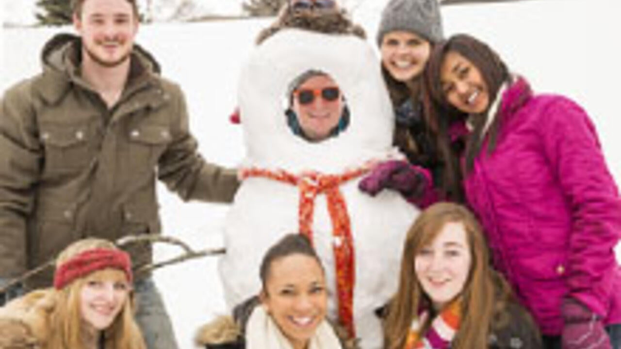 Waterloo students pose with snowman