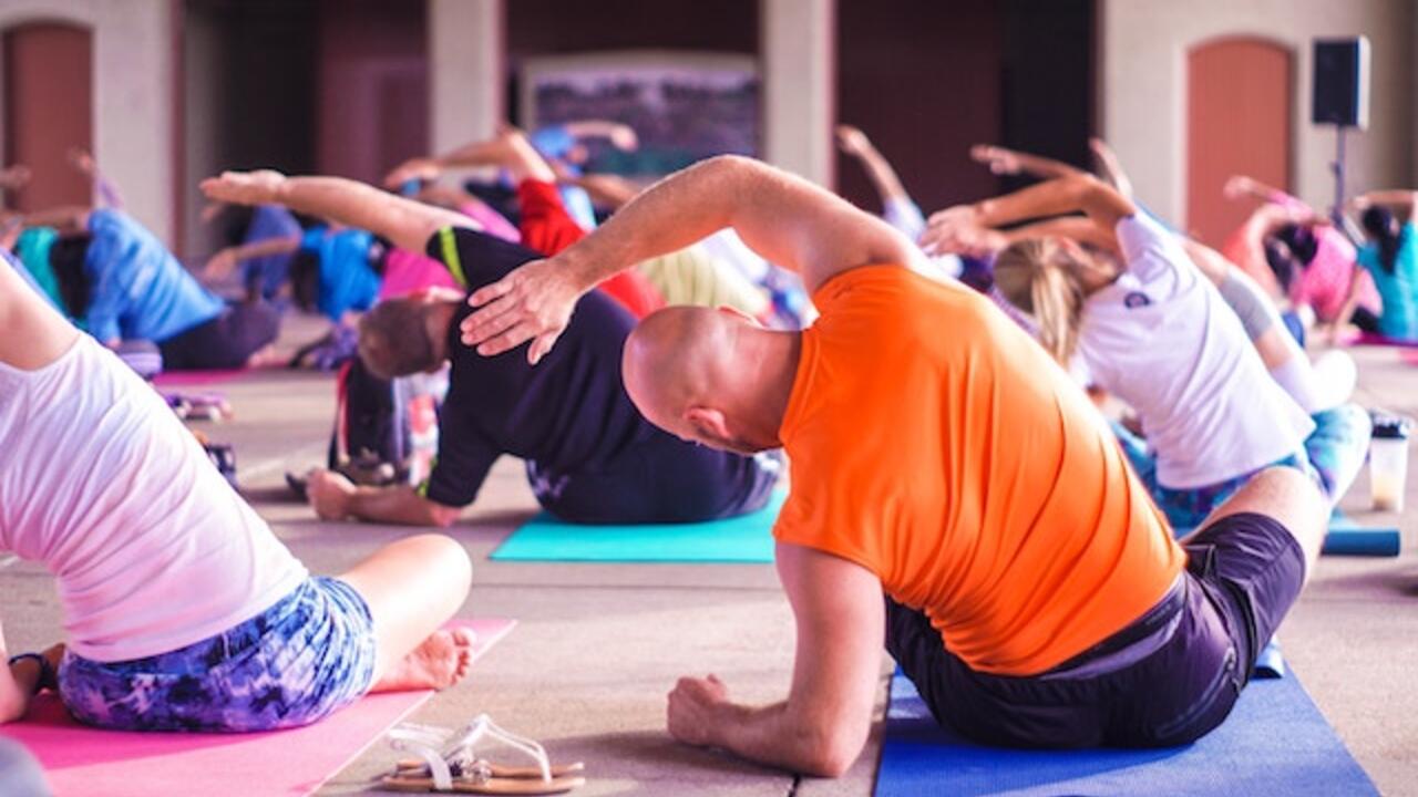 People doing yoga.