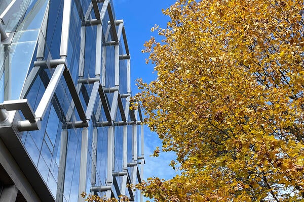Exterior of QNC with fall foliage on the trees