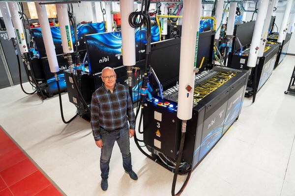 John Morton stands in front of the Nibi servers