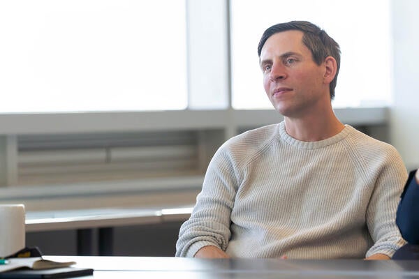 Dr. Doug Kavanagh listens intently during a presentation 