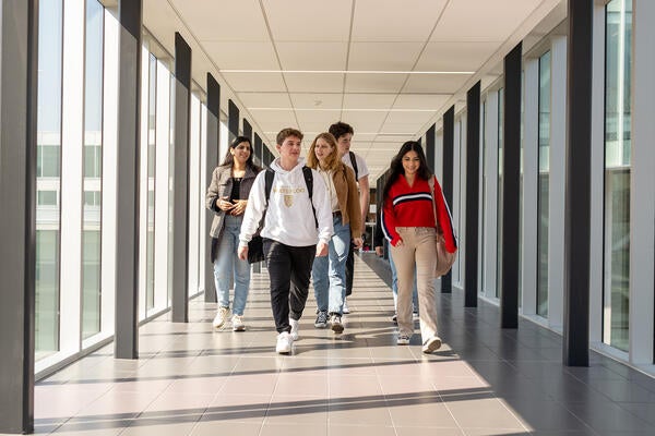 Students walking down a hallway