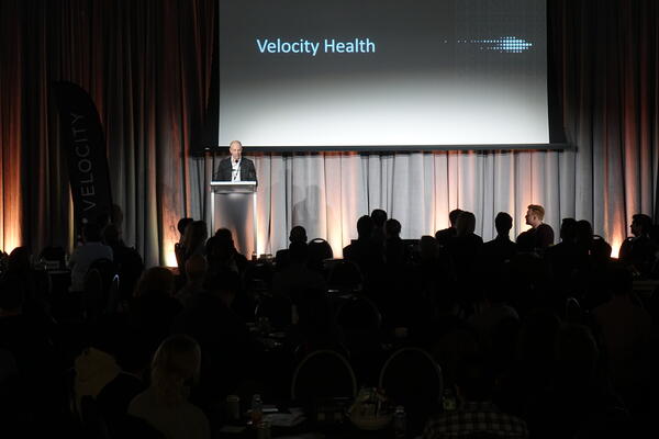 Adrien Cote speaking at Velocity Health launch event